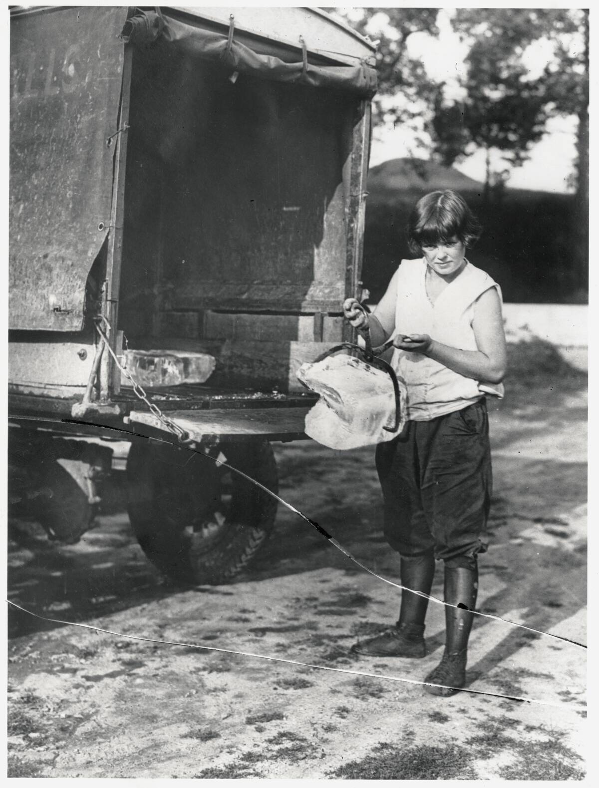 Woman Holding Block of Ice