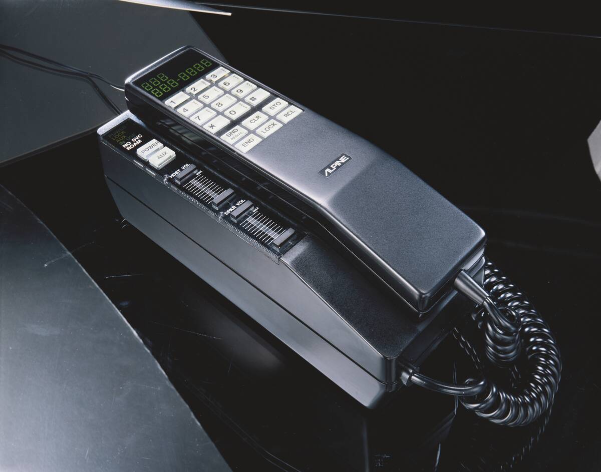 Vintage telephone on black background, close-up