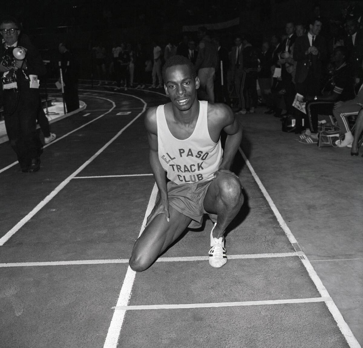 Bob Beamon Kneeling On Track