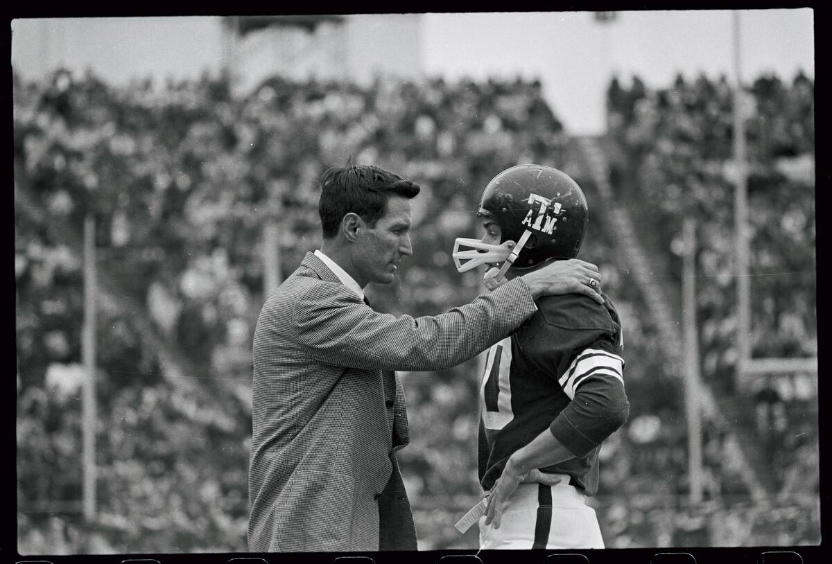 Gene Stallings Gripping Shoulders of Football Player