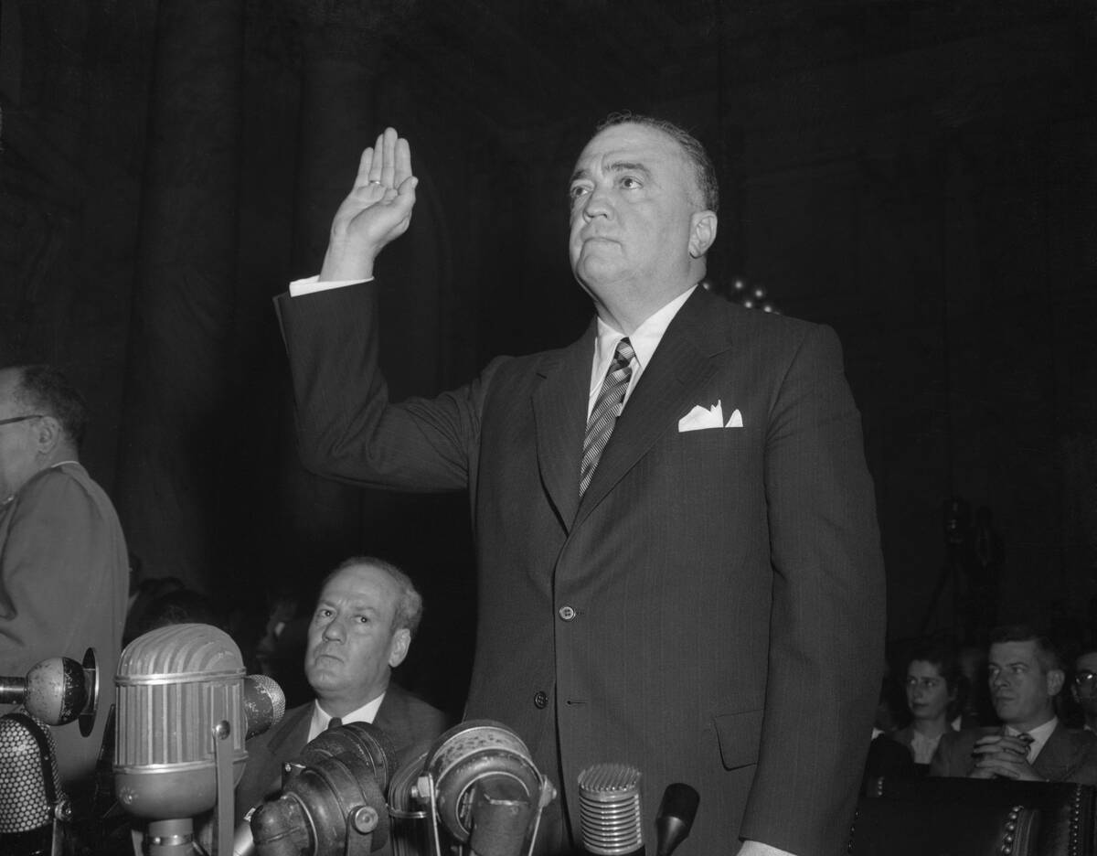 J. Edgar Hoover Raising Hand to Testify