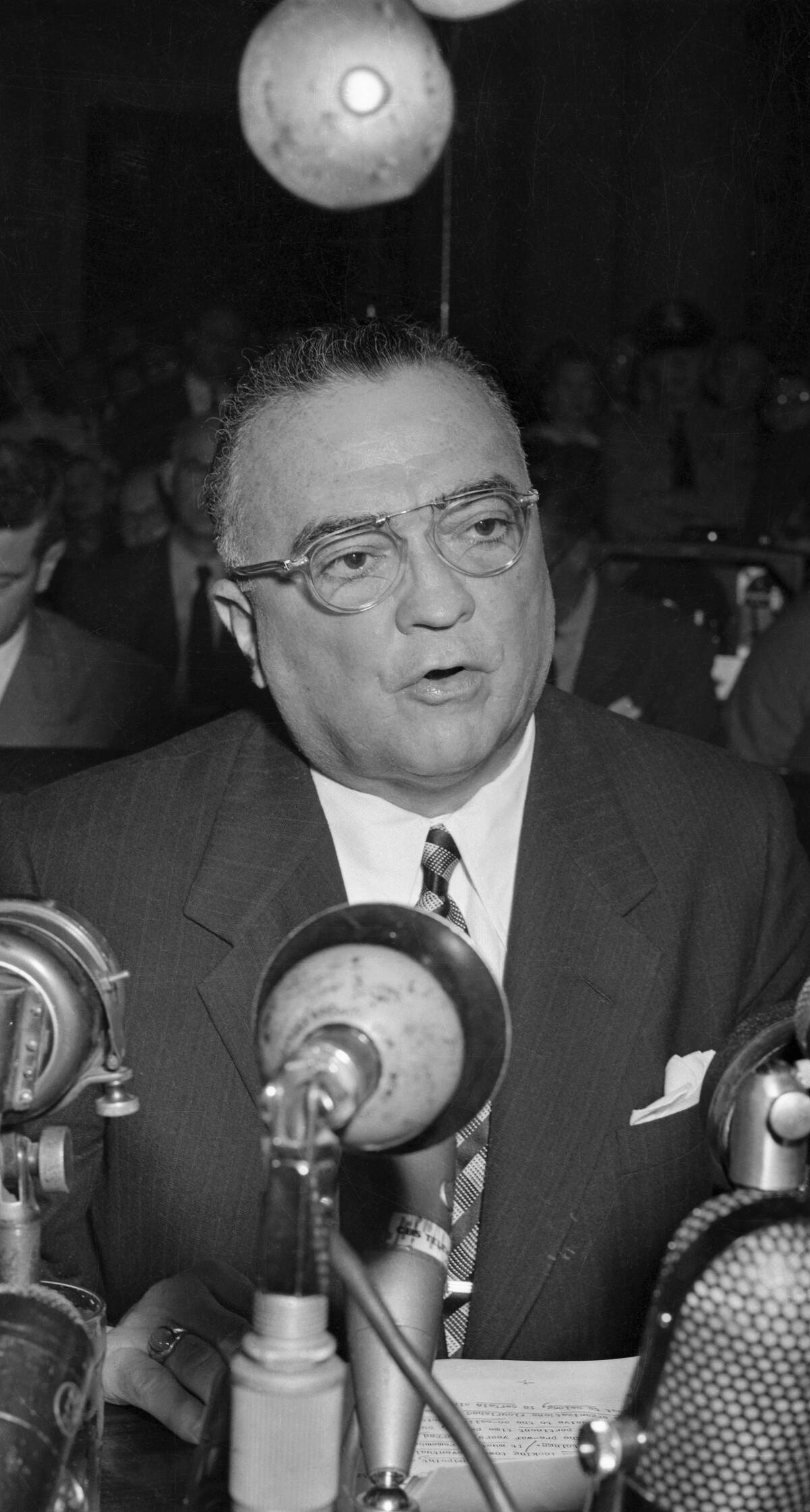 J. Edgar Hoover Speaking into Microphones
