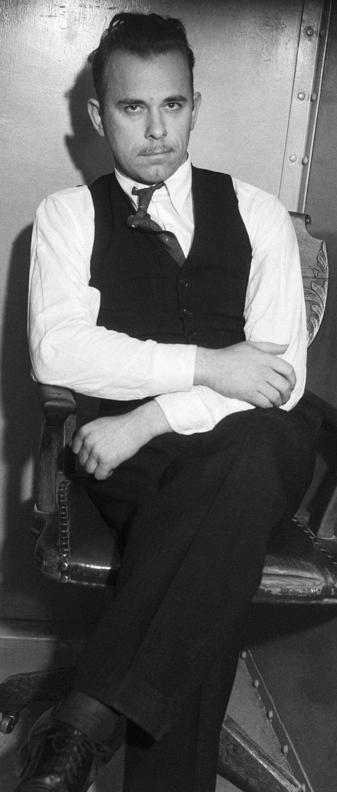 John Dillinger Sitting in Police Custody
