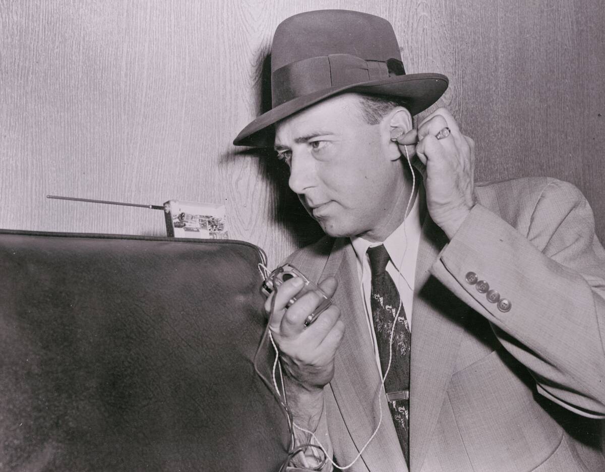 Man Using a Listening Device