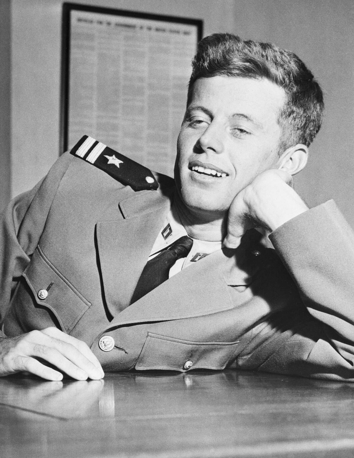 Navy Lieutenant John F. Kennedy Leaning On Arm