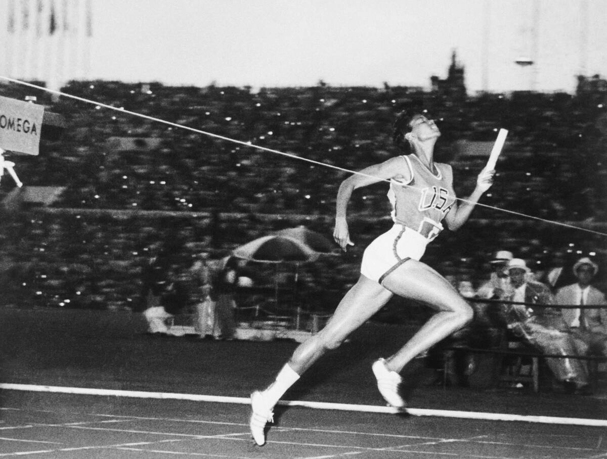 Wilma Rudolph Crossing the Finish Line in Relay