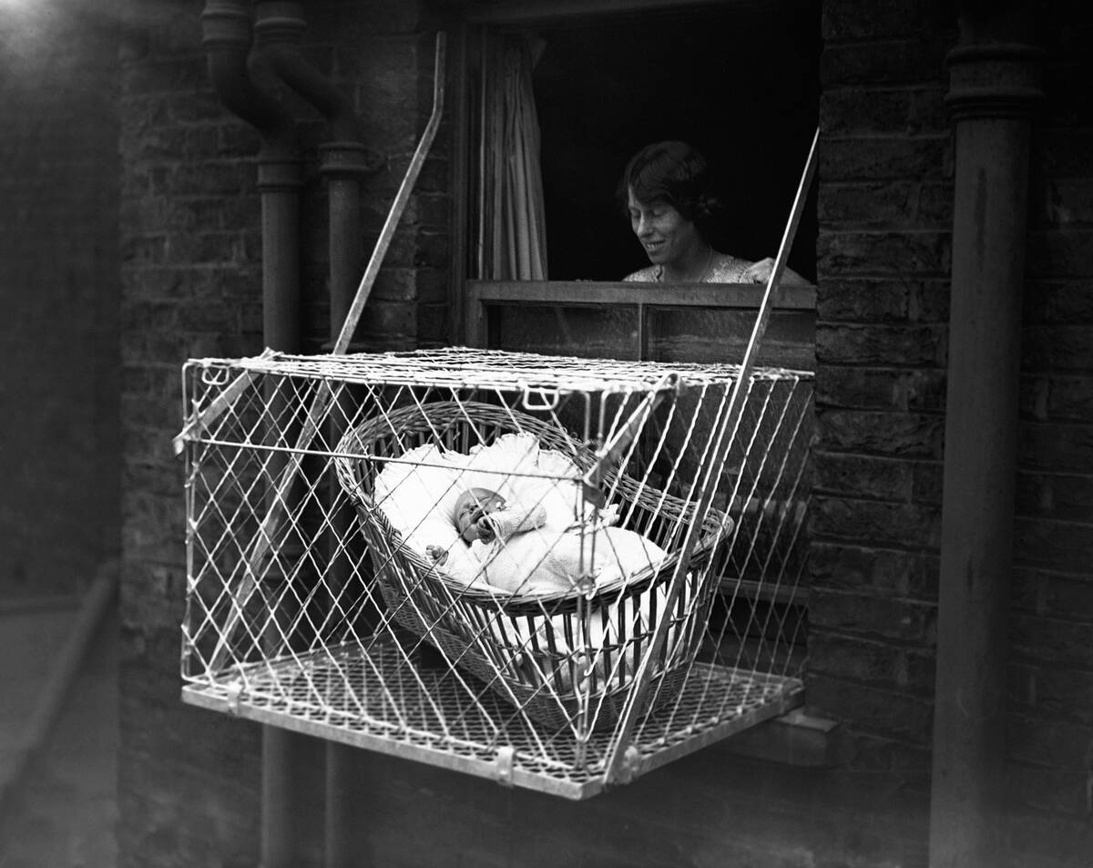 Baby in Cage Hung Out of Window