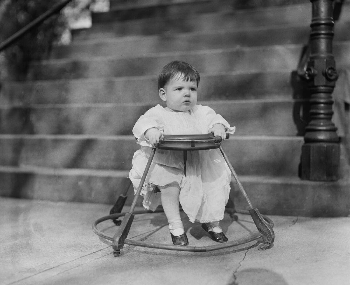Baby in Walker on Sidewalk, Washington DC, 1921