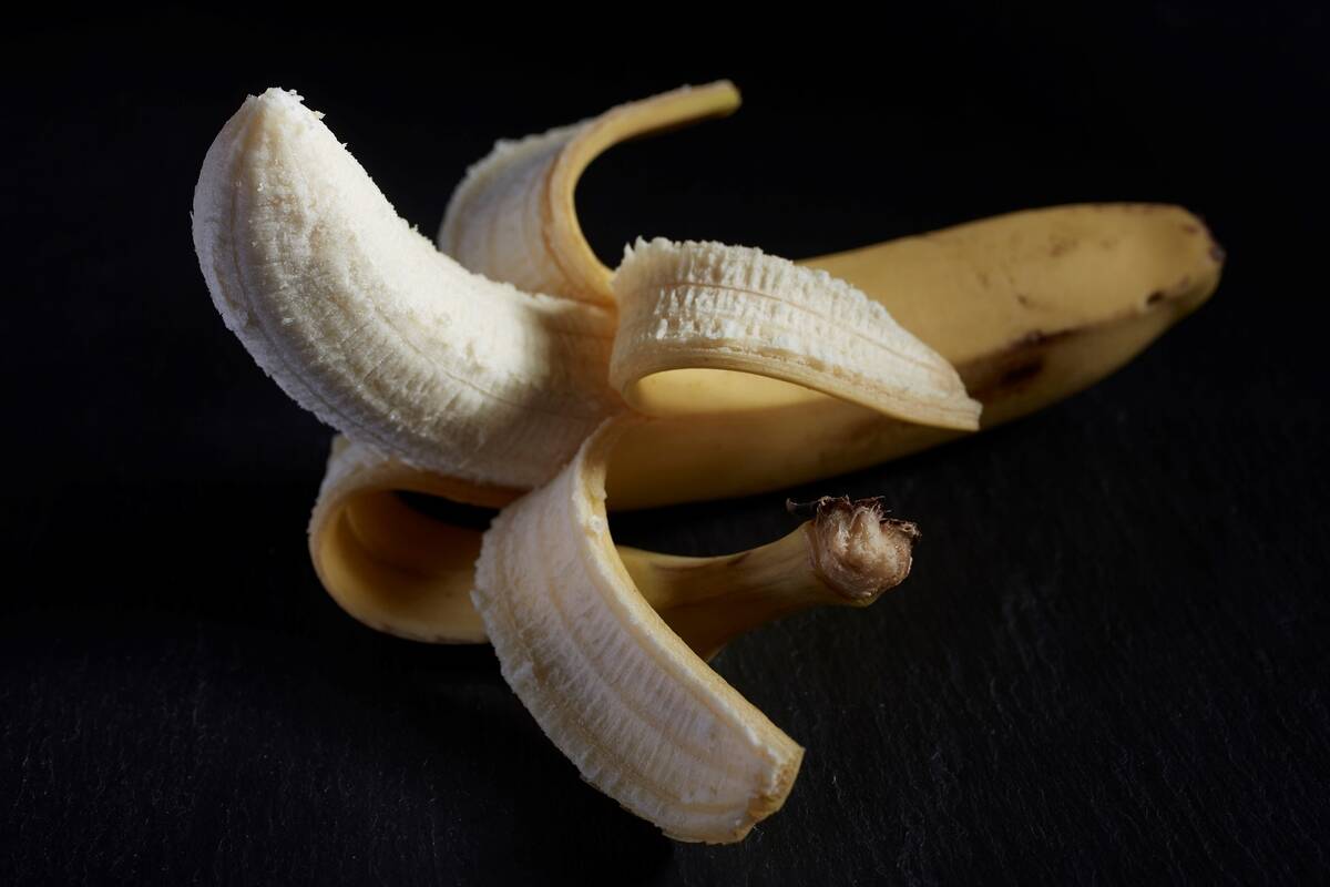 Banana fruit on a black background