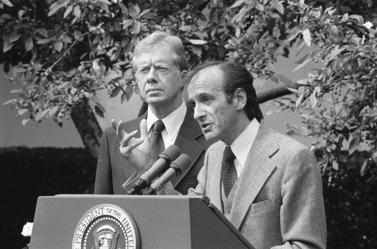 Jimmy Carter Stands Behind Elie Wiesel