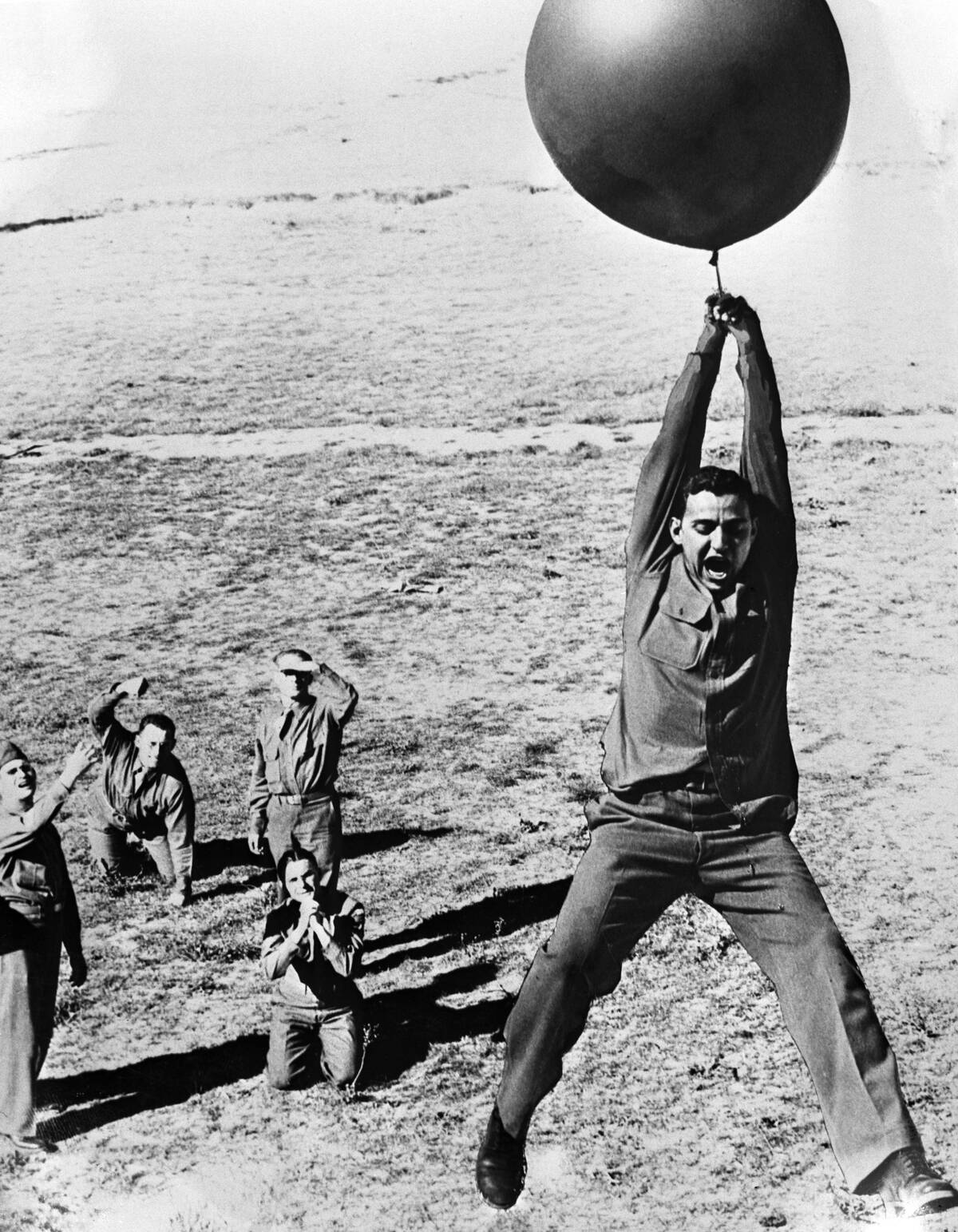 Man lifted from ground by helium filled balloon