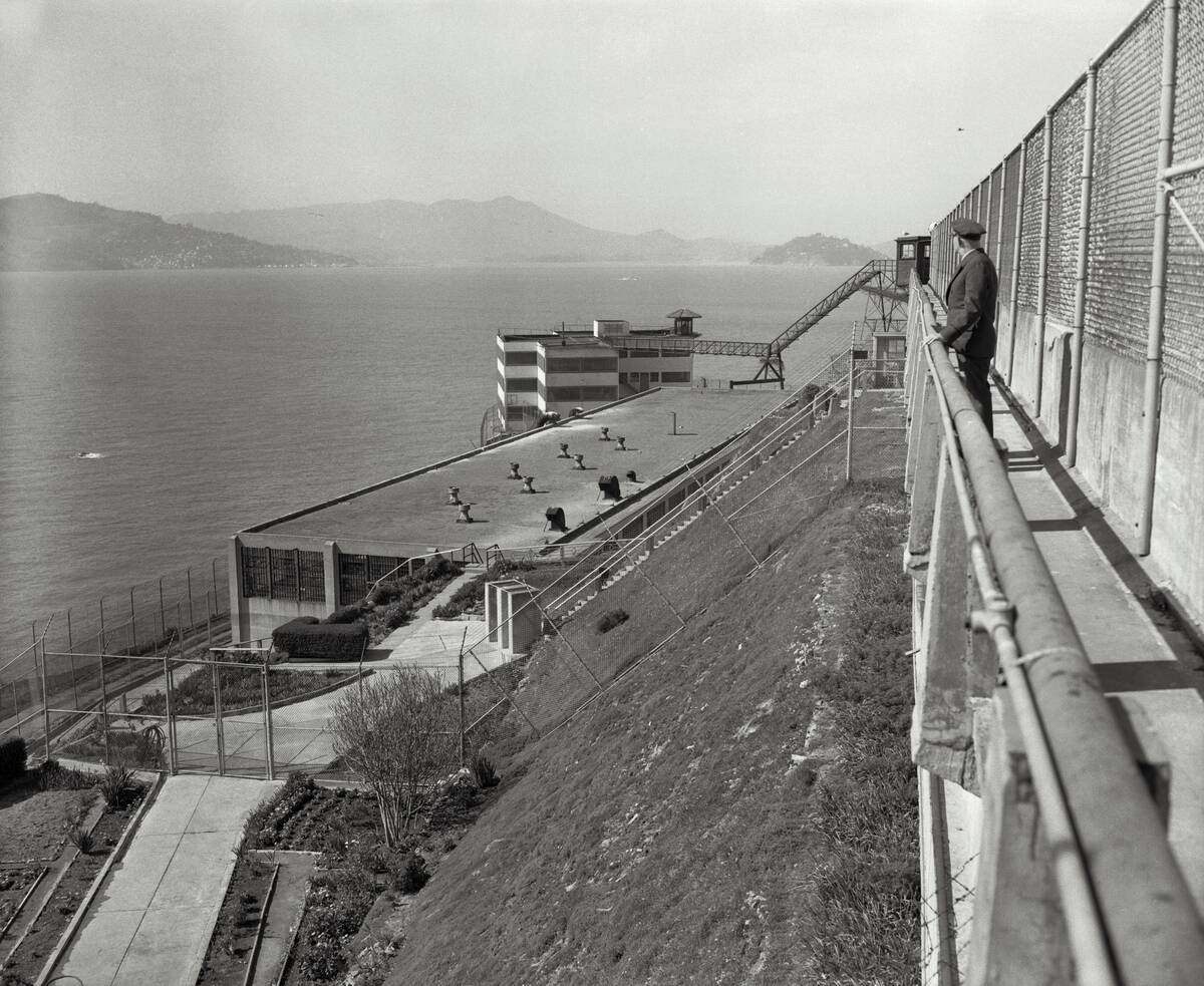 Prison Guard Standing and Gazing Outside Alcatraz