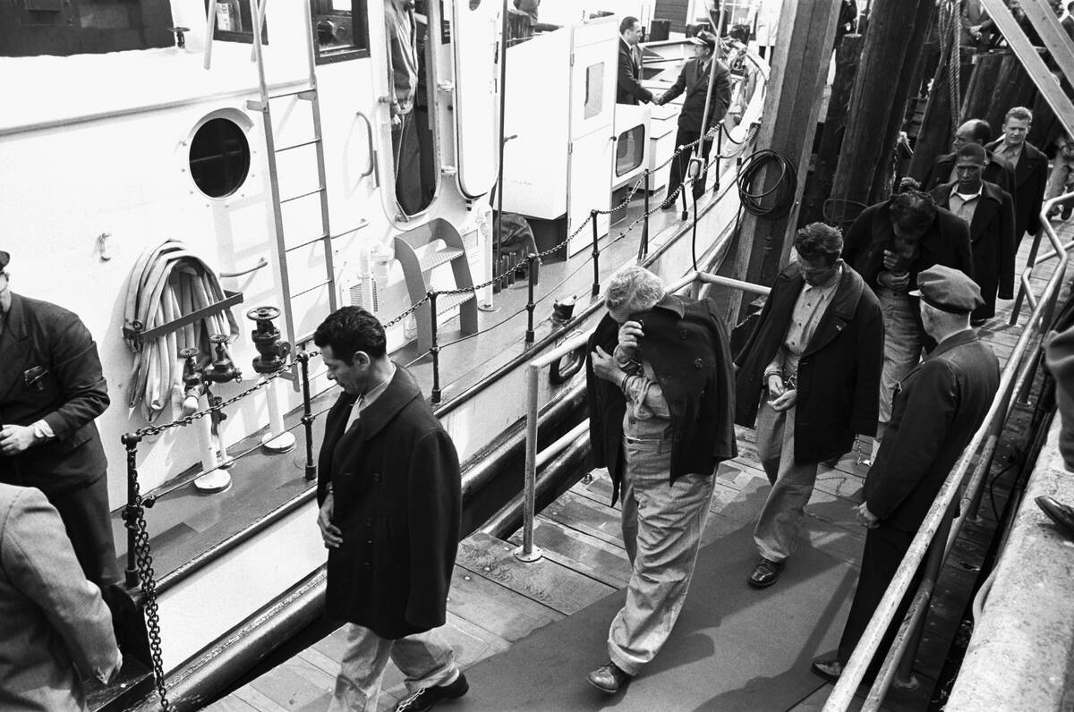 Prisoners Being Loaded Onto a Boat