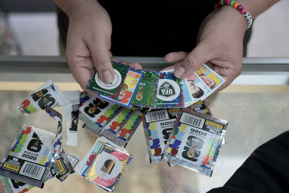 Soccer Fanatics Collect Panini World Cup Stickers Ahead Of Tournament