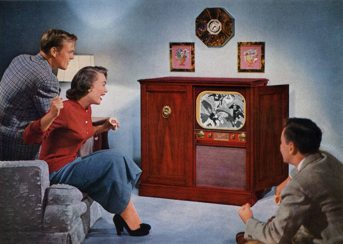 1950s Family Watching Football