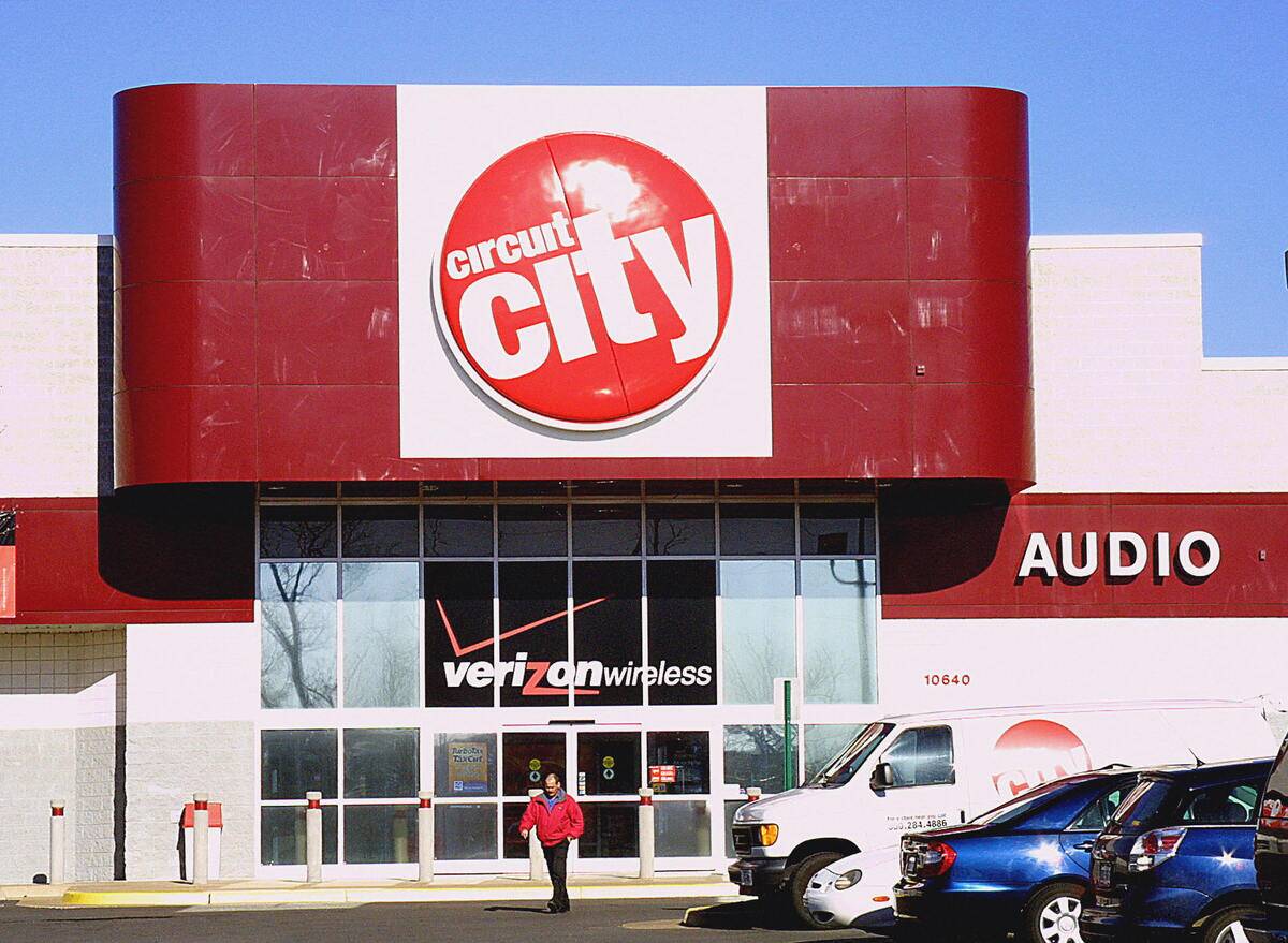 A patron exits a Circuit City electronic