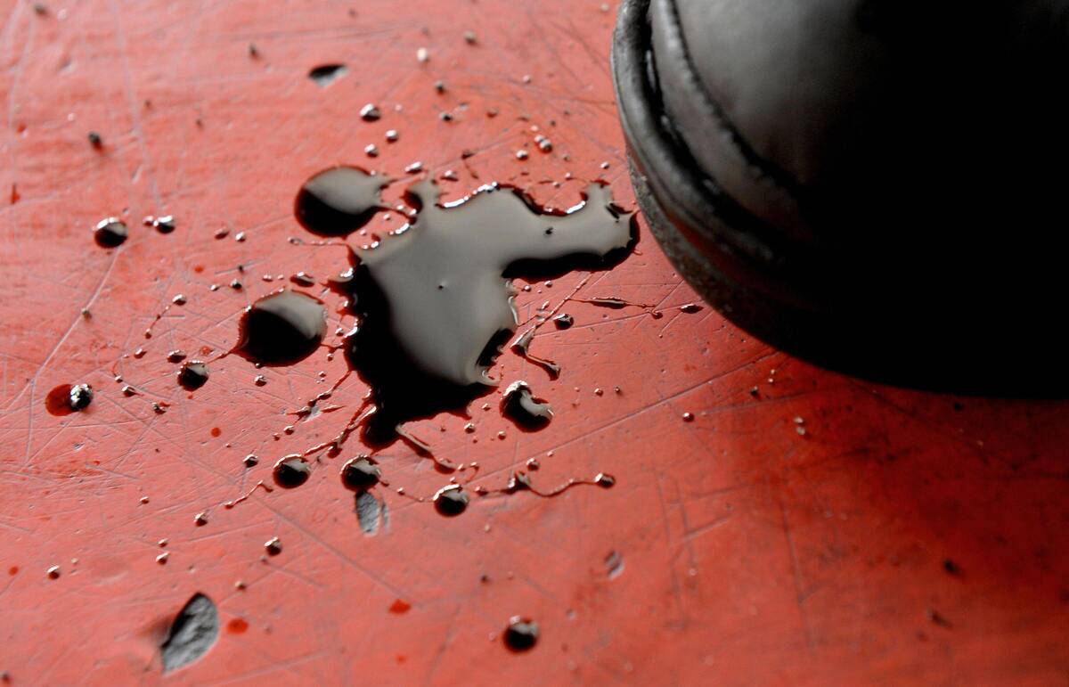 A stain of oil is seen on the floor of a