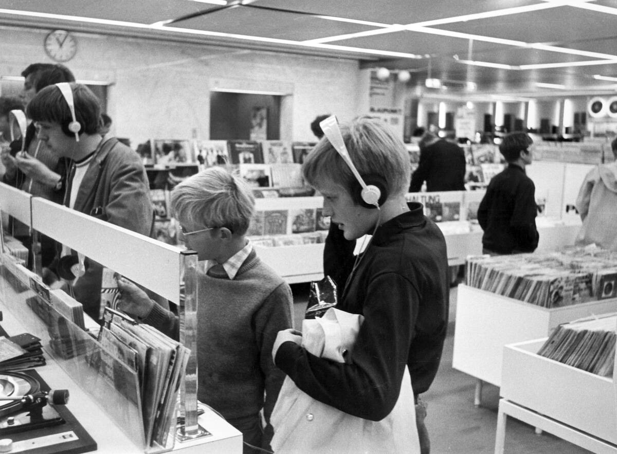 Adolescents in a record shop