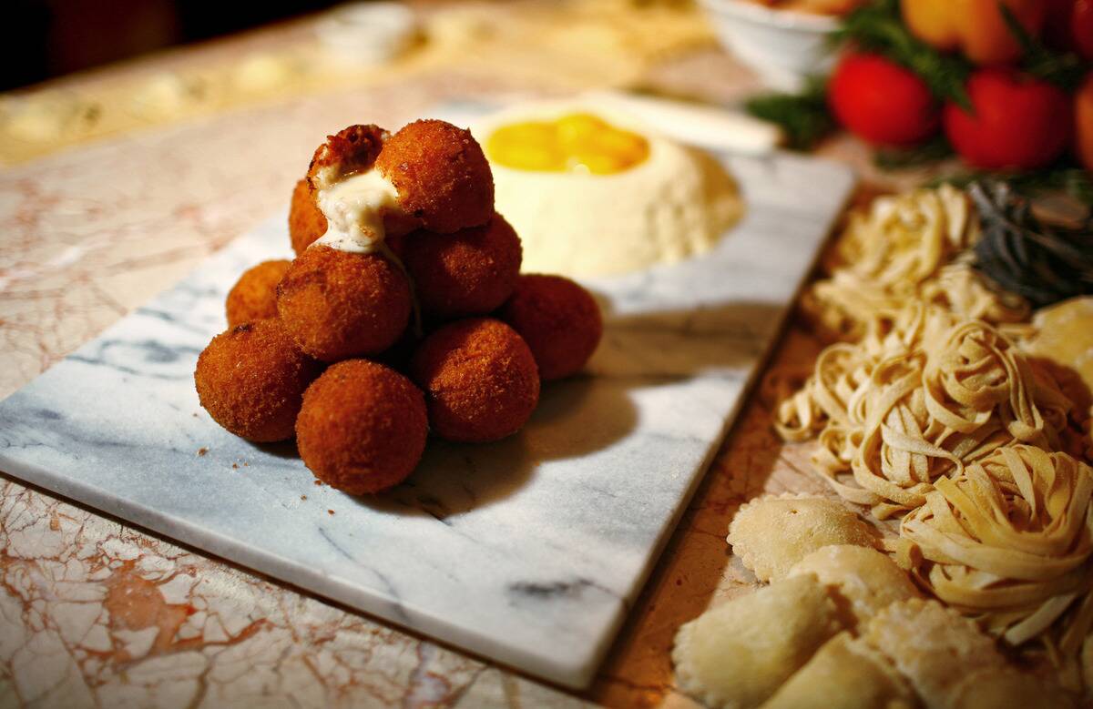 Arancini appetizers, which are balls of rice dusted with bre
