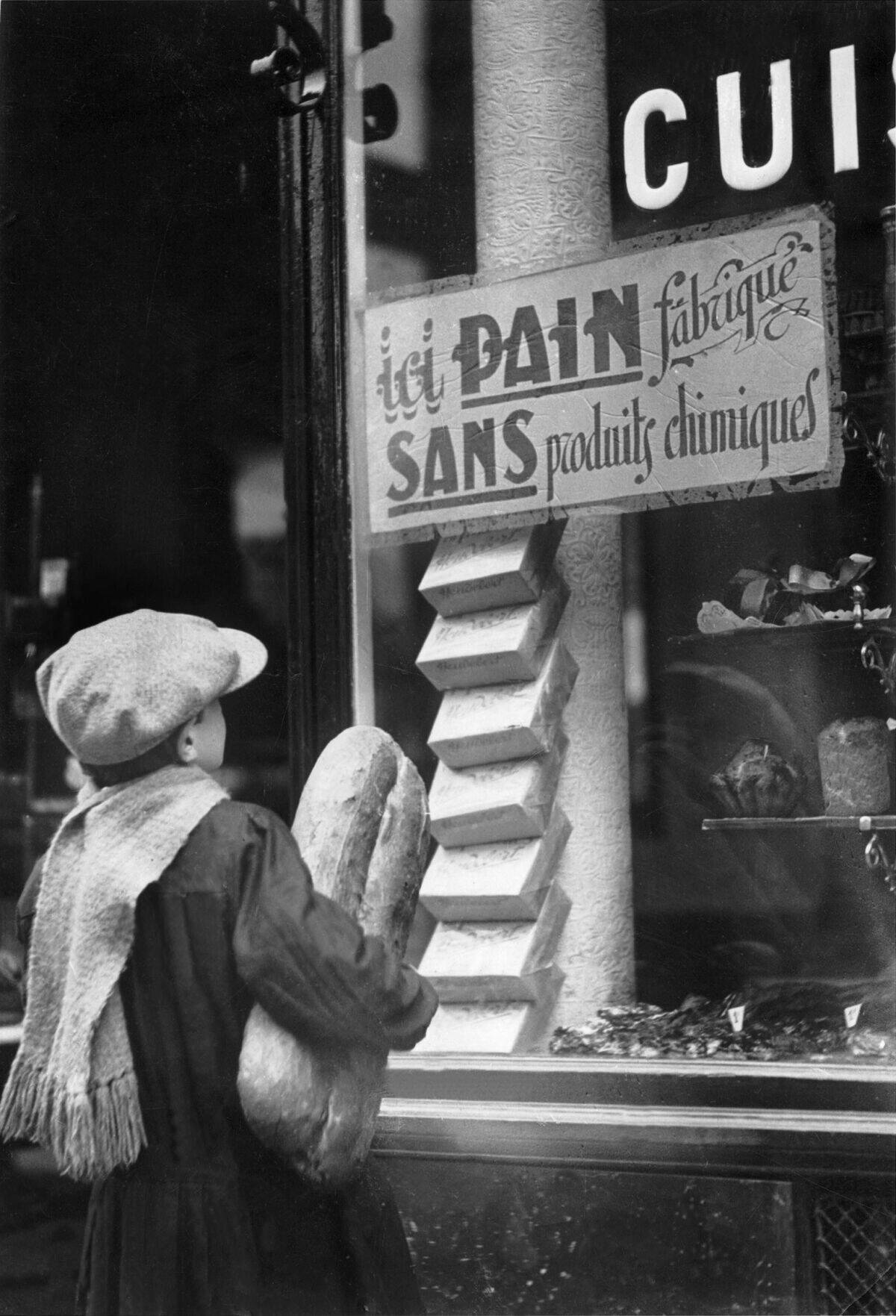 Child Carrying Bread 1920-1930