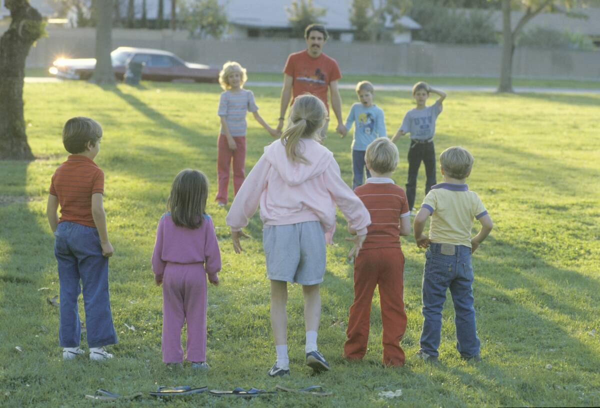 Children playing a game at a public park, Garden Grove, CA
