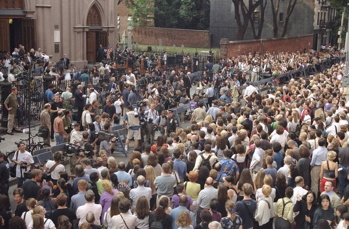 Crowd gathers outside Old St. Patrick's Cathedral during mem