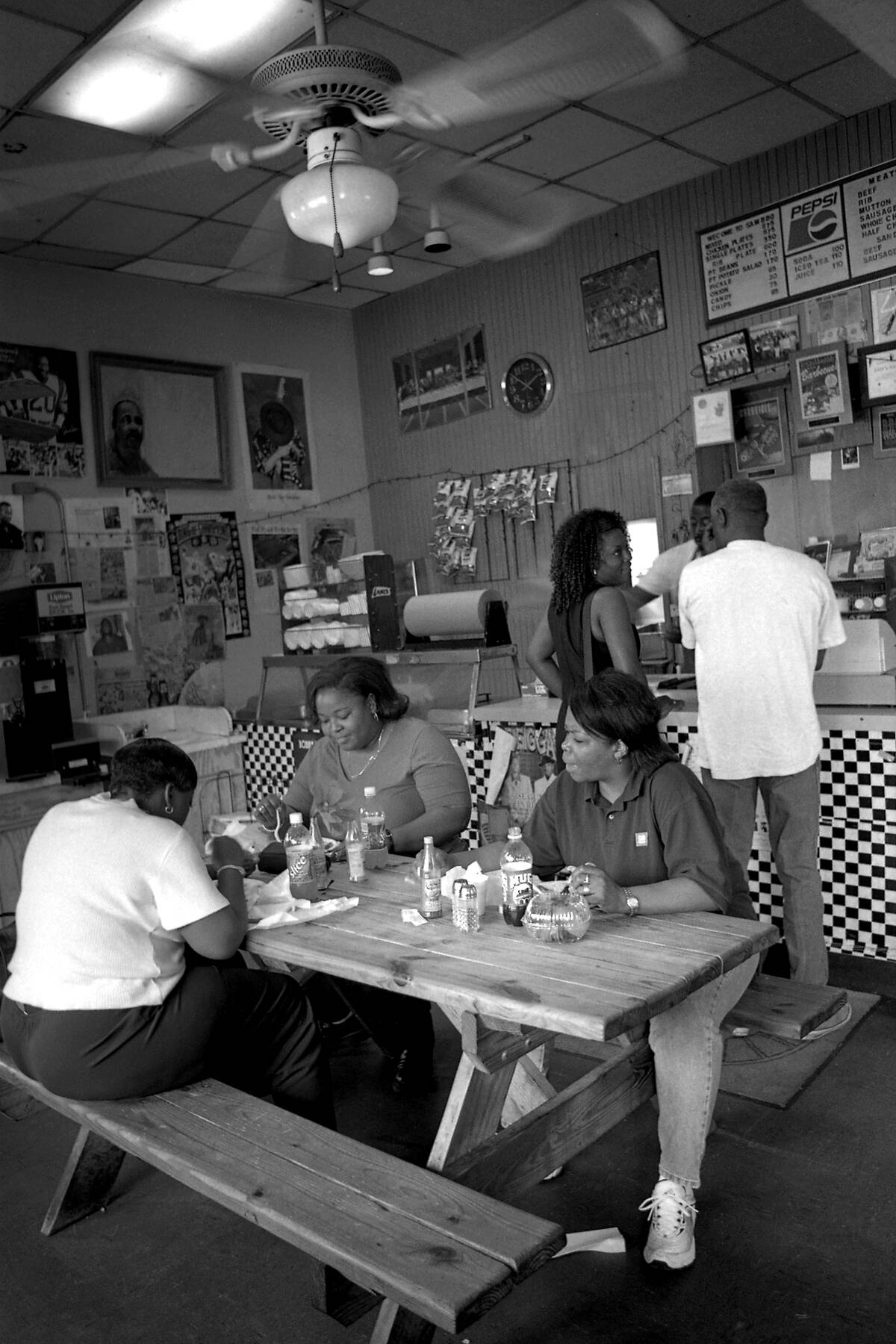 Customers At Sam's BBQ