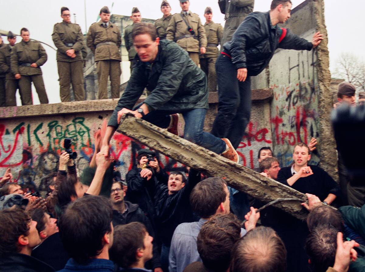 Dismantling the Berlin Wall Friday Morning
