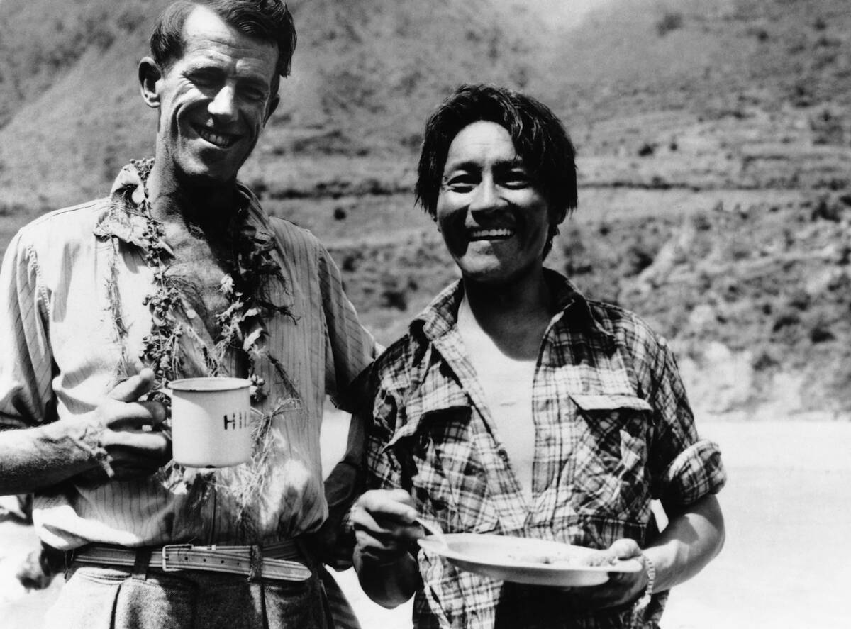 Edmund Hillary and Tenzing Norgay Enjoy a Snack
