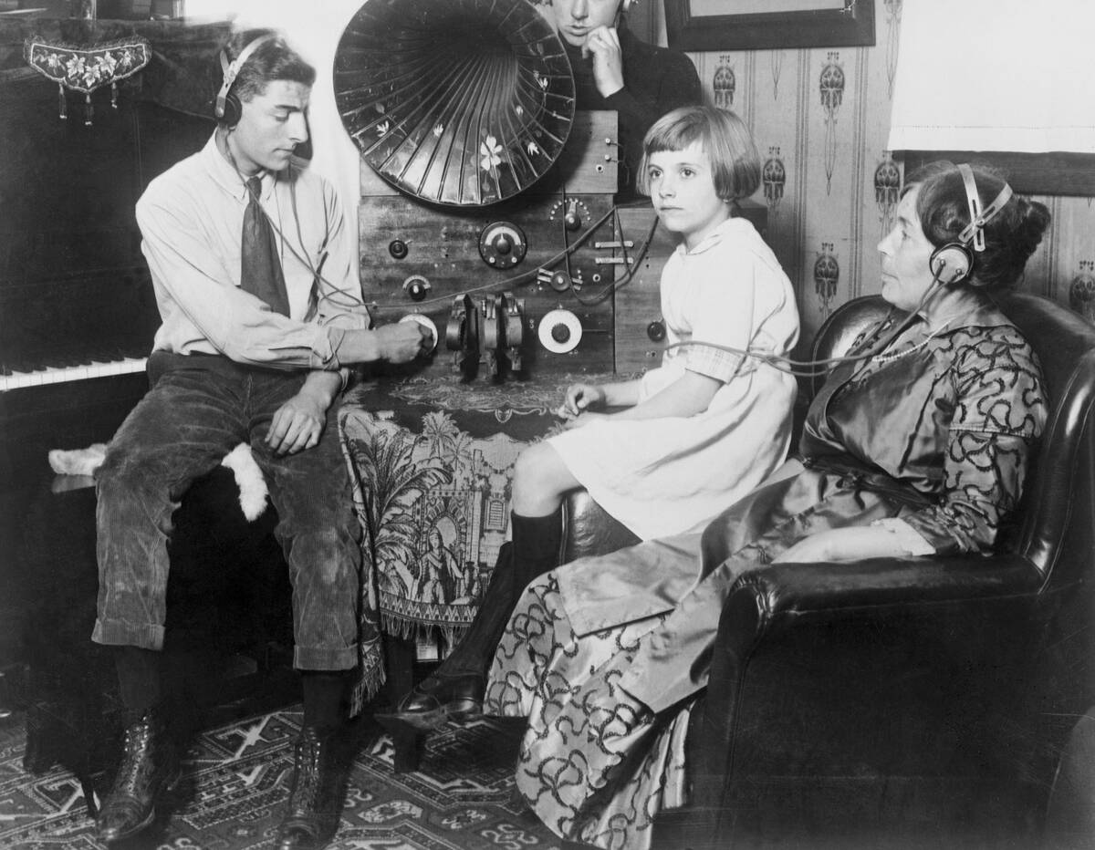 Family Listening to a Radio