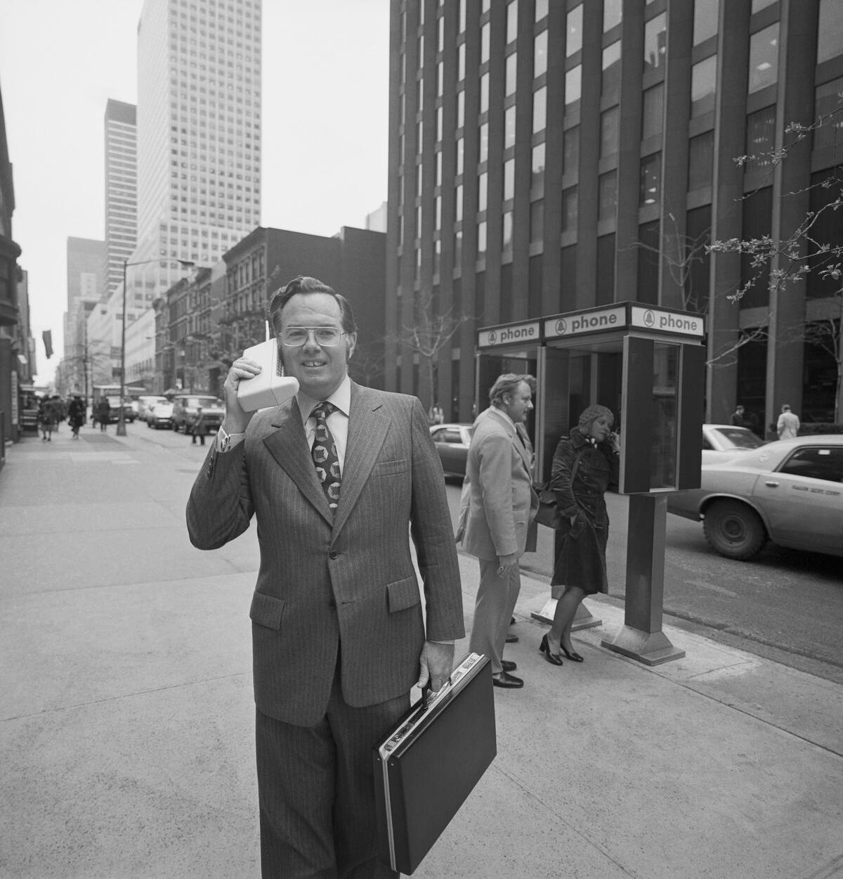 John F.. Mitchell Using the Portable Radio Telephone