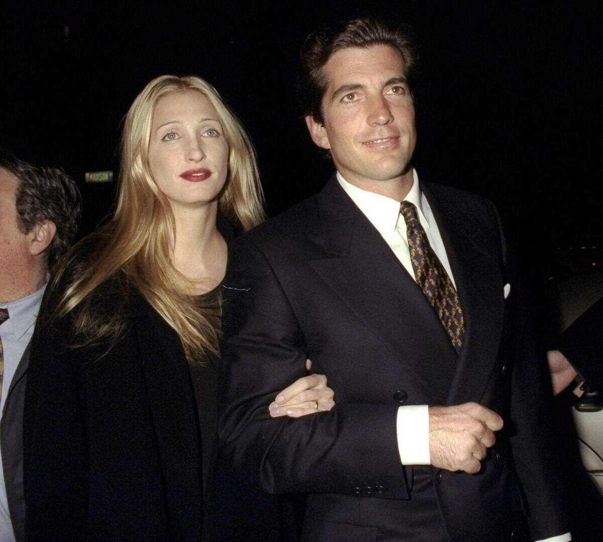 John Kennedy and Caroline Bessette attending party celebrati