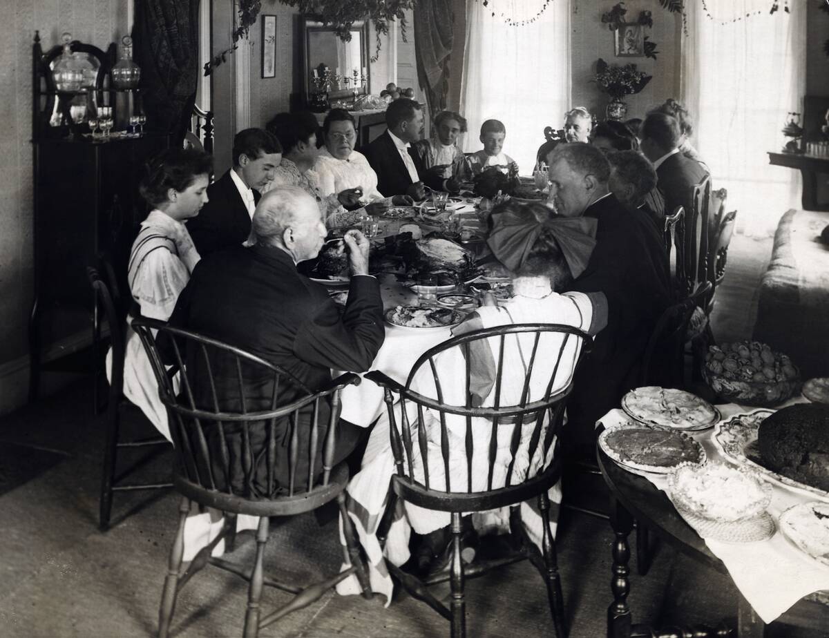 Large Family Eating Thanksgiving Dinner
