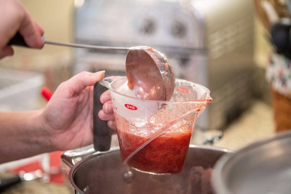 Making strawberry jam in the kitchen, Bryantown, MD