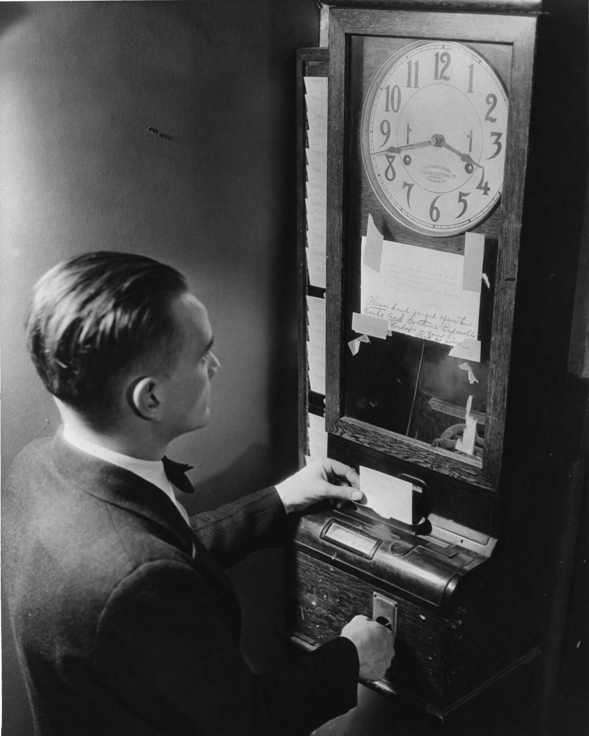 Man Punching Clock