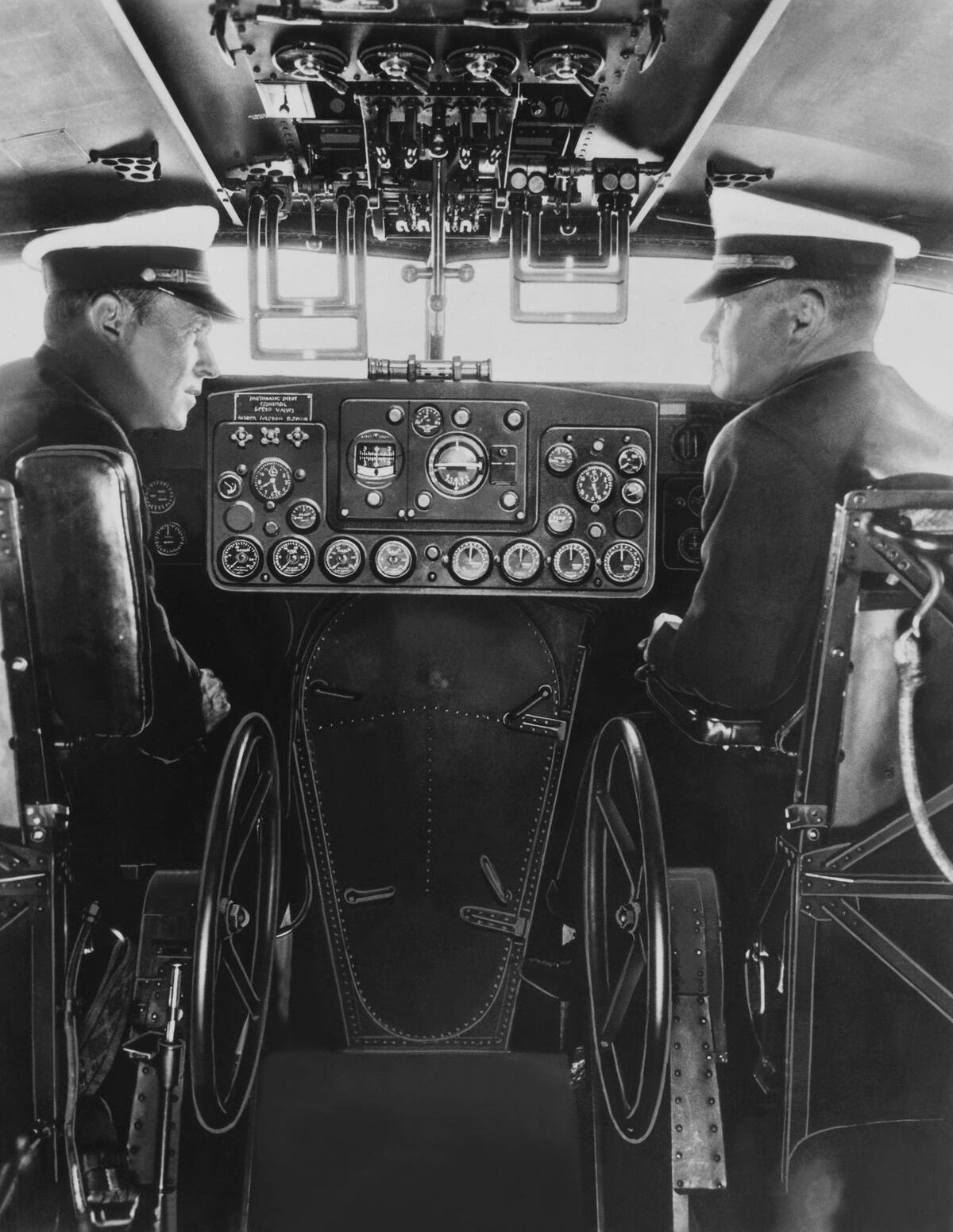 Pilots Sitting In The Cockpit Using Automatic Pilot At San Francisco In California