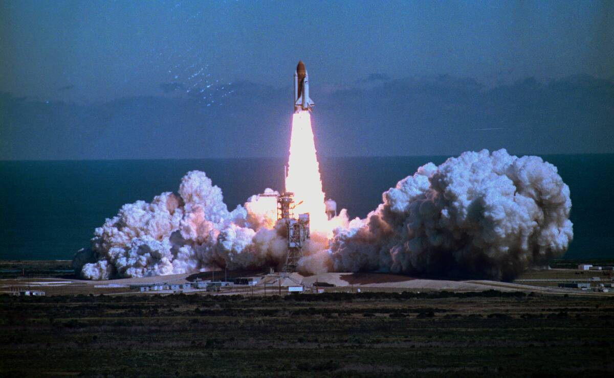 Space Shuttle Challenger Blasting off into Sky