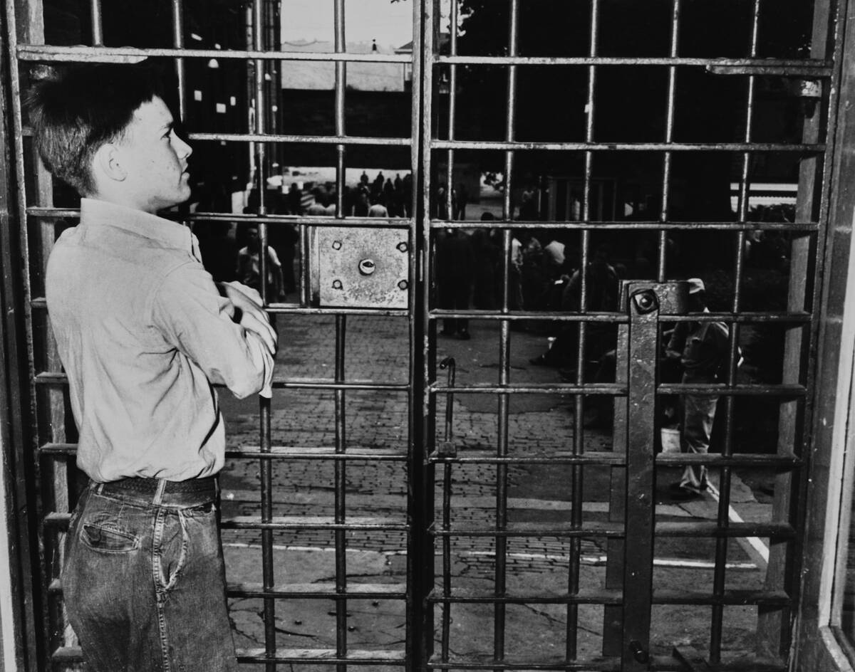 Teenager In Prison Cell