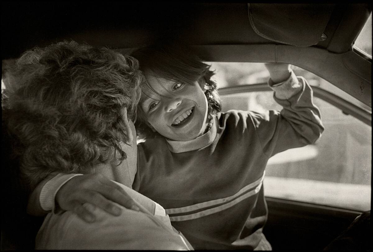 Young Girl & Missionary In A Car