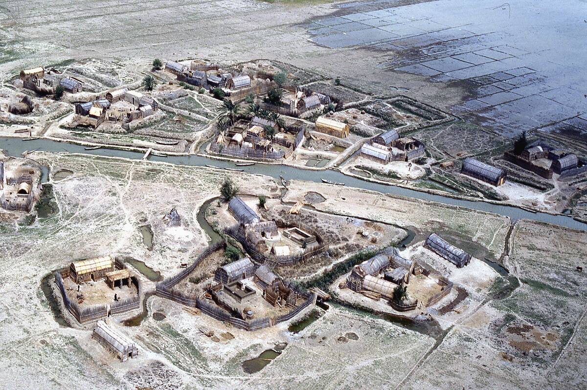 Aerial View of Marsh Arab Reed House Village in dry Flood Plain of Tigris and Euphrates Rivers of Southern Iraq in mid-1970s