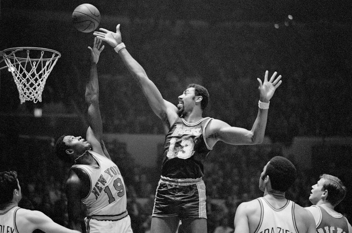 Basketball Players Jumping for Rebound