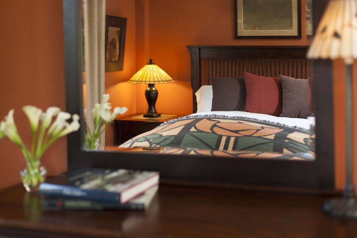 Bedroom interior blend of mission style Inn, PA, USA