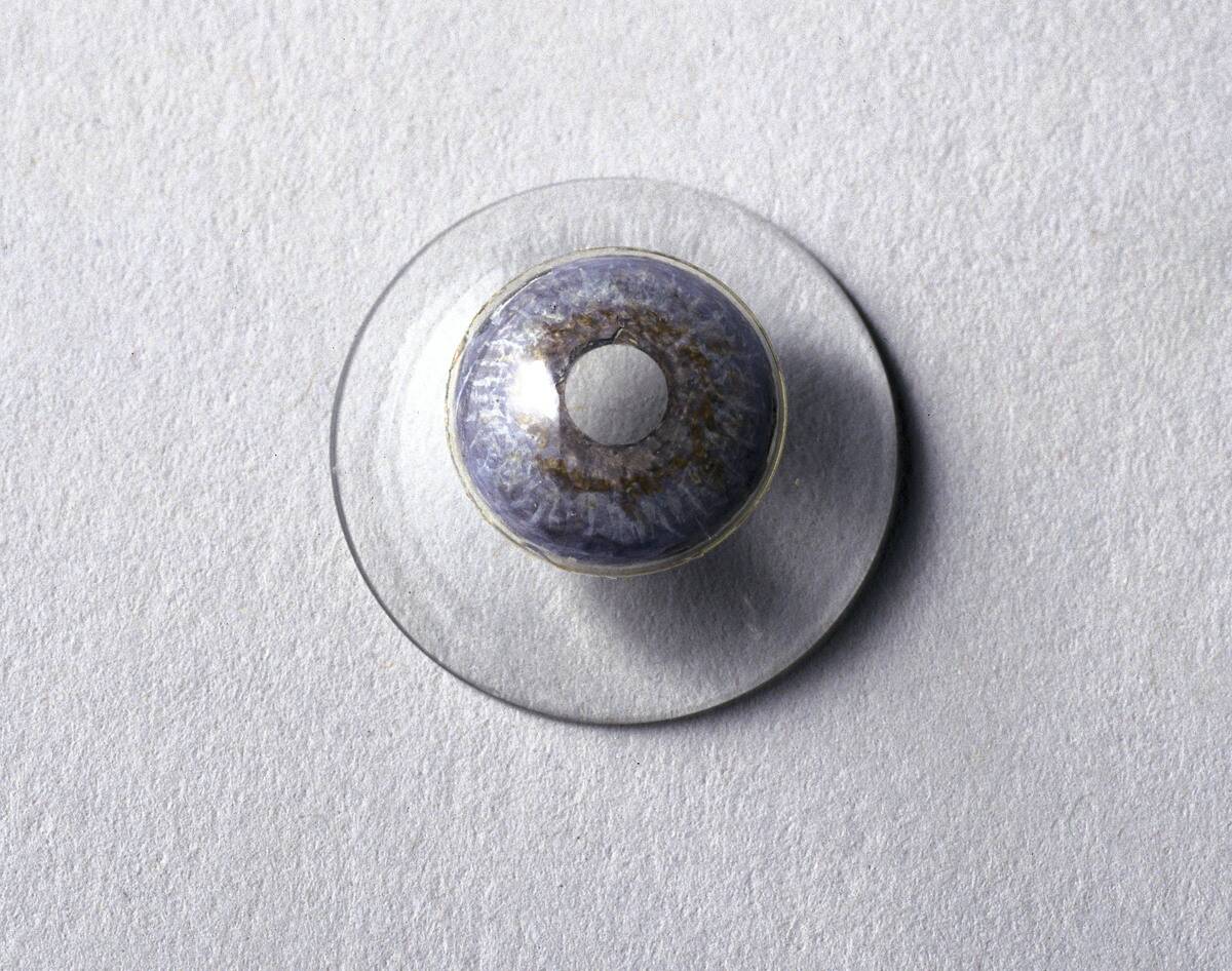 Blown glass contact lens, c 1930.