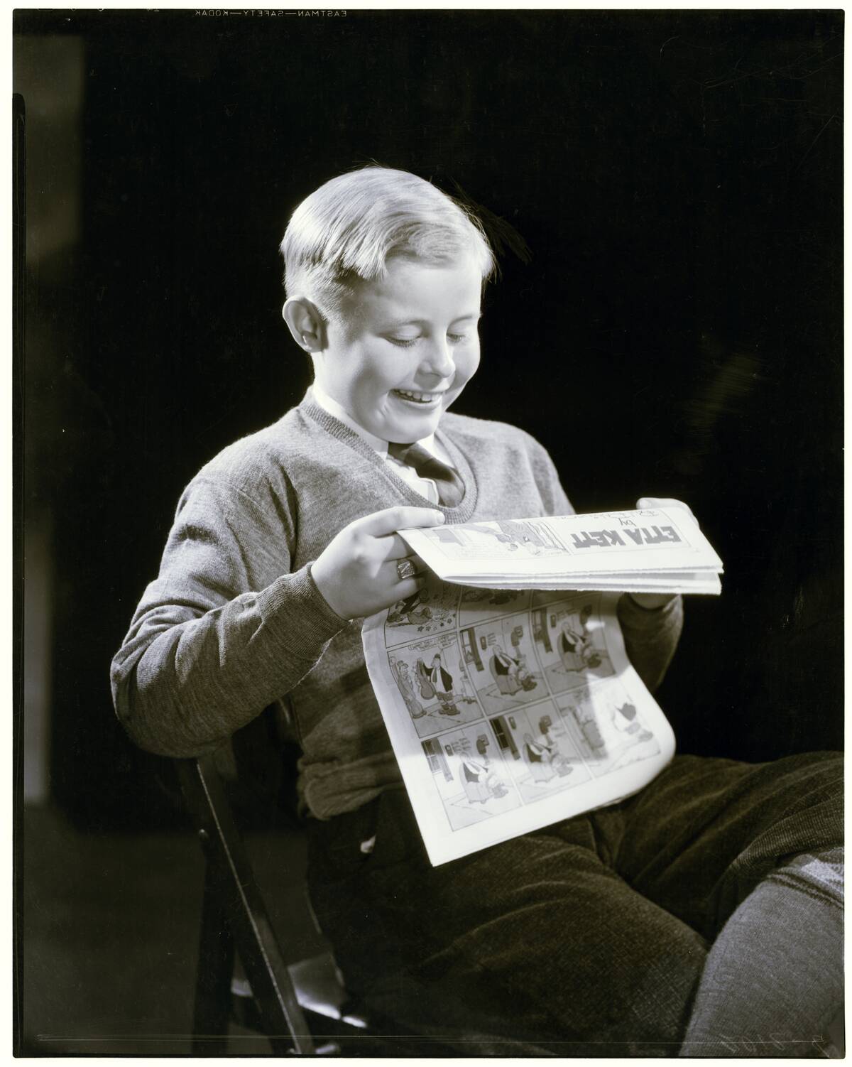 Boy Reading Comics