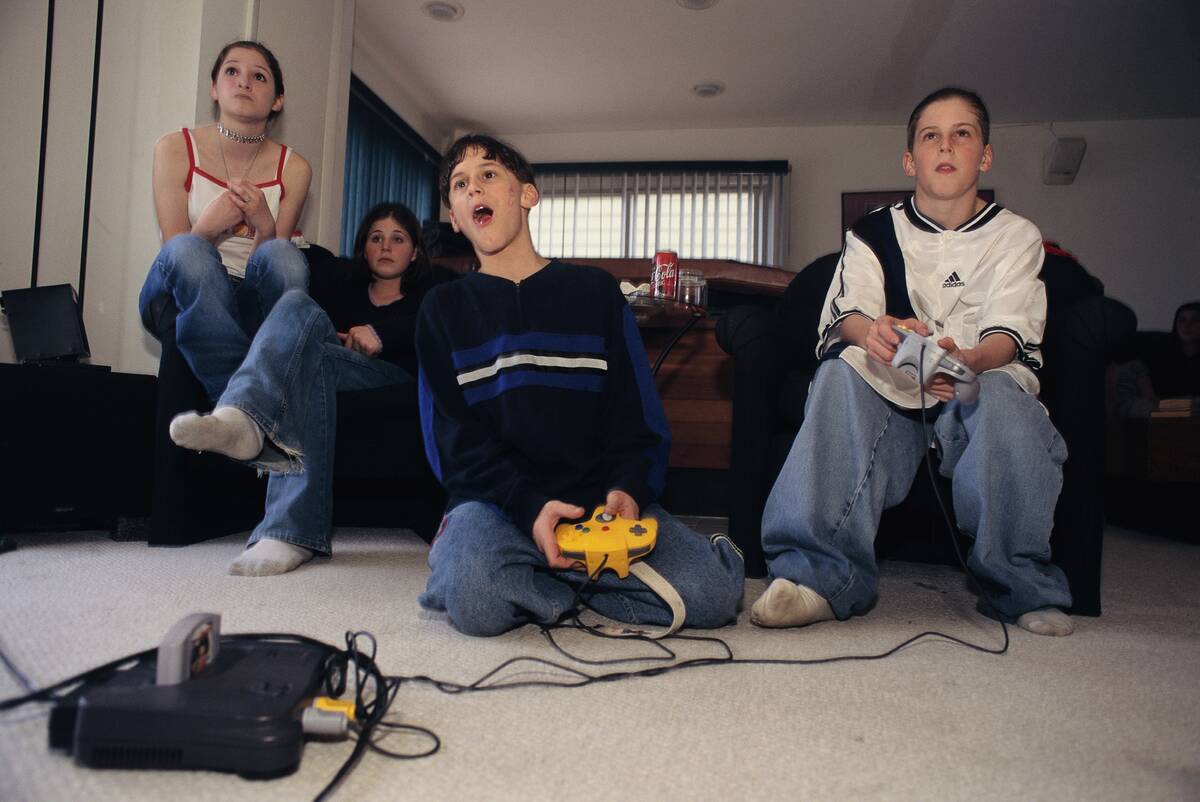 Friends Playing Video Games in Living Room