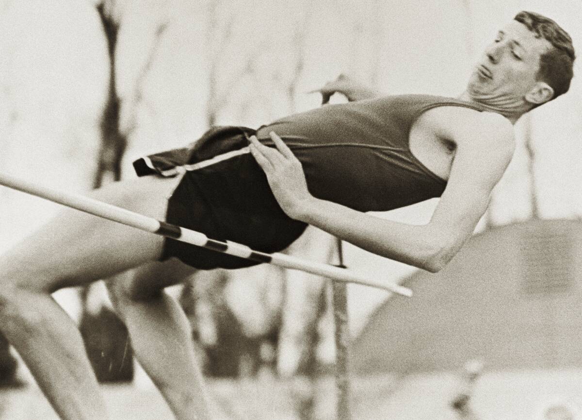 High Jumper Dick Fosbury Making Unconventional Jump