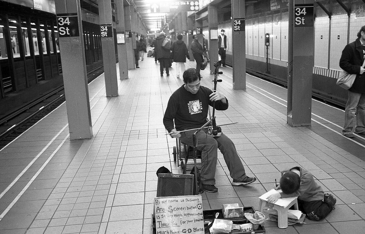 Musician In The 34th Street Subway Station