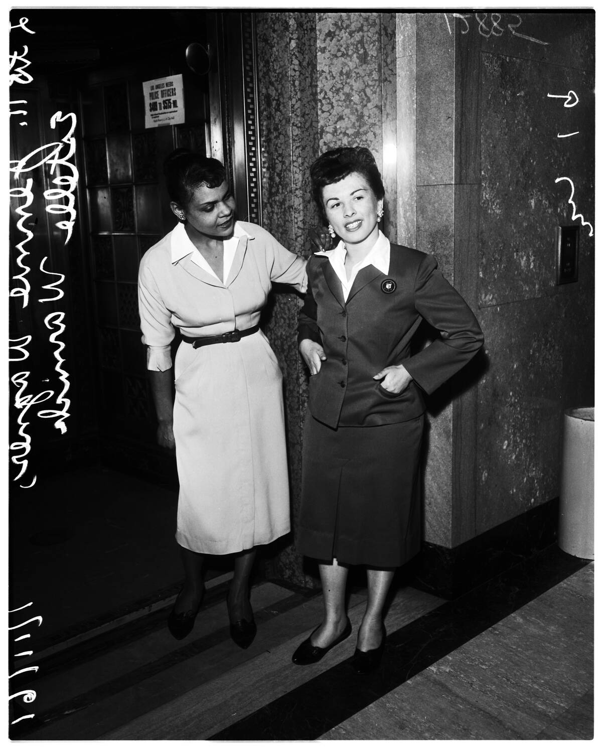 New uniforms for City Hall elevator operators, 1961.