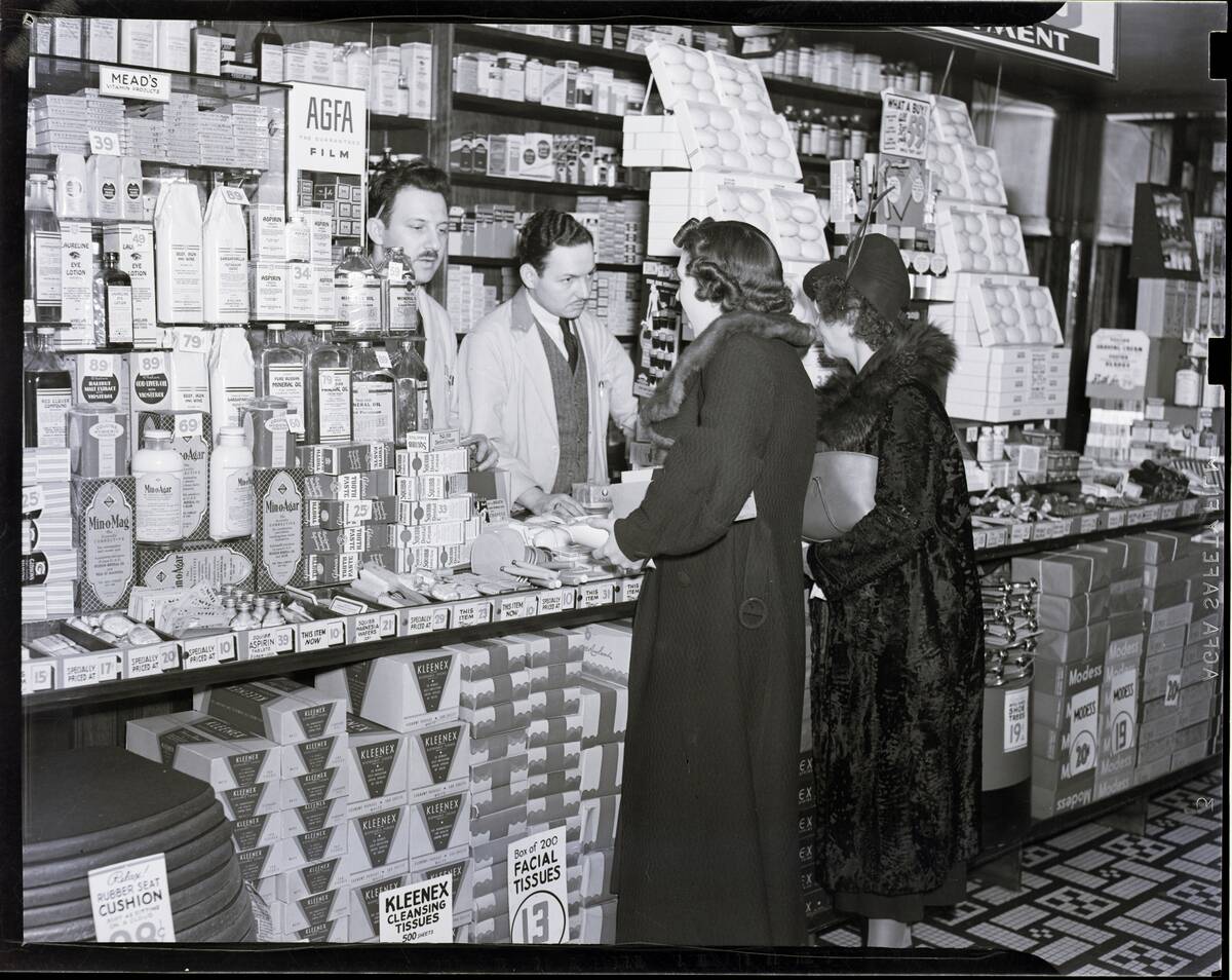 Photo Of Two Ladies In Crowded Drugstore