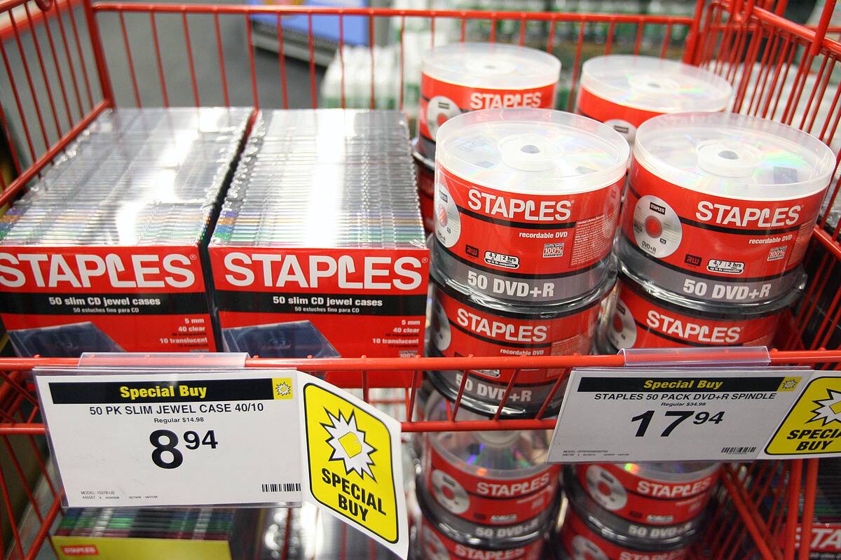 Staples brand slim CD jewel cases and DVD-R spindles are pic